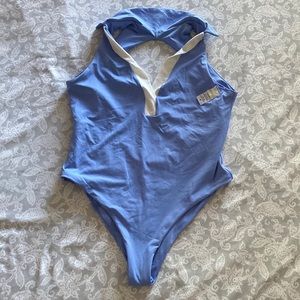 L Space one piece size 8